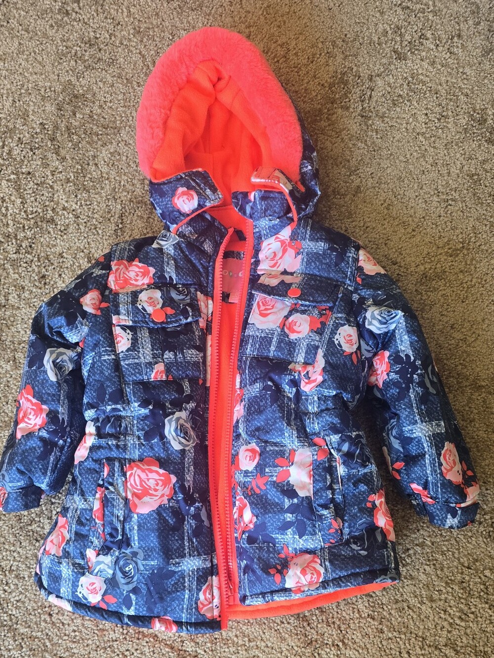 Girls Wippette Navy Floral Puffer Jacket with Coral Lining. Winter, Snow.